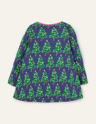 Mini Boden Girl's Printed Jersey Pocket Tunic in Starboard Blue Christmas Trees