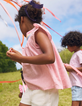 Mini Boden Girls Frilly Woven Smocked Top in Blossom Pink