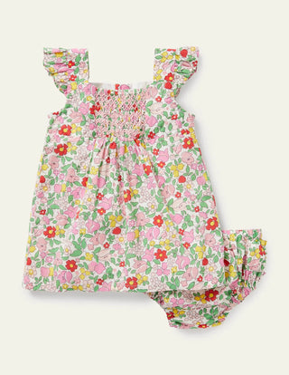Baby Boden Flutter Sleeve Floral Smocked Dress in Pink Lemonade Ditsy Floral