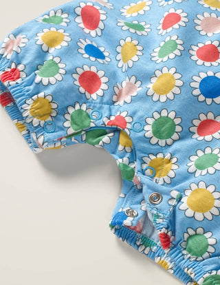 Baby Boden Neon Pompom Trim Printed Romper in Blue Floral
